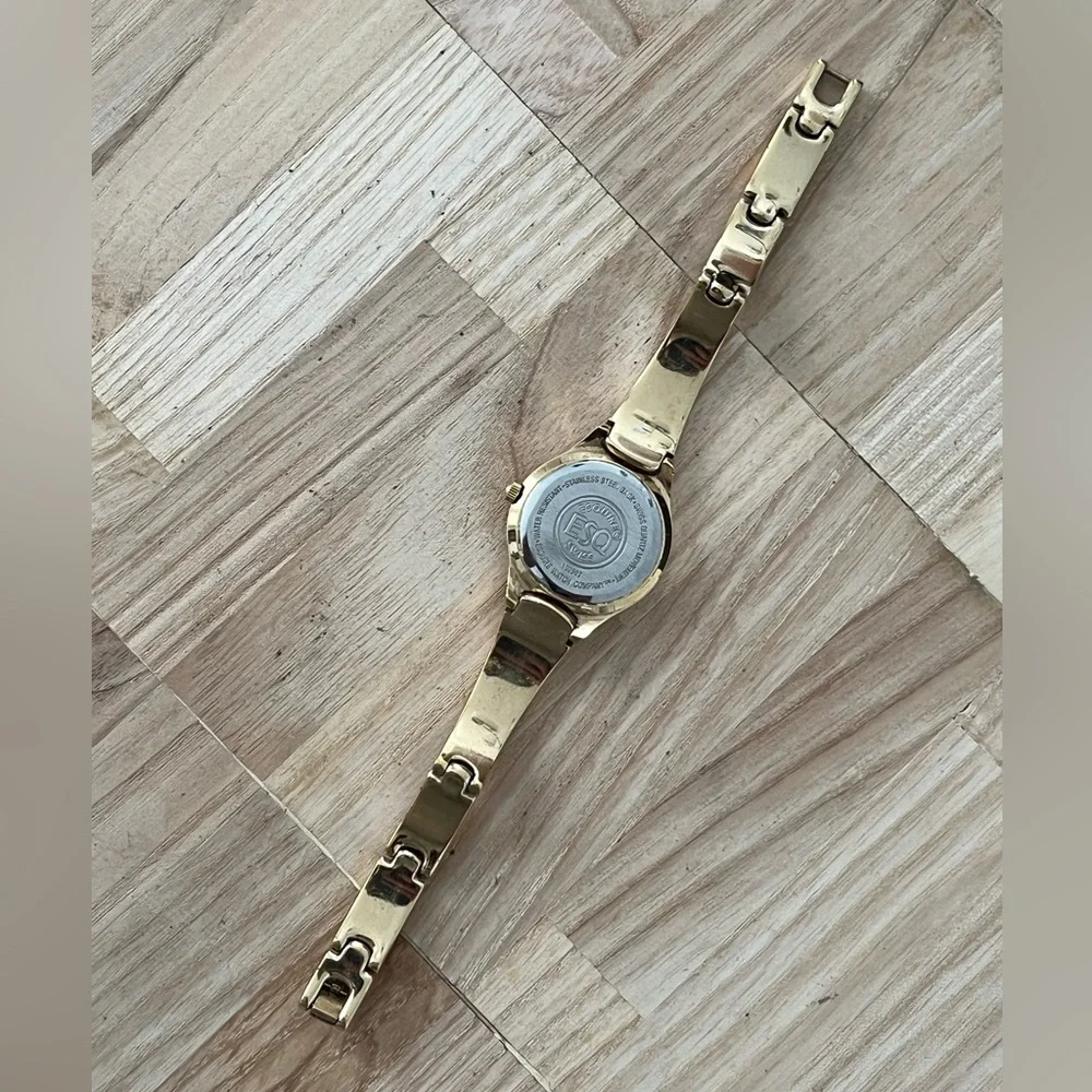 ESQ by Movado Ladies Watch Black Dial Gold Tone Bracelet and Hands